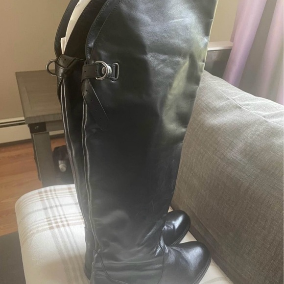 Women’s tall leather boots . NEW